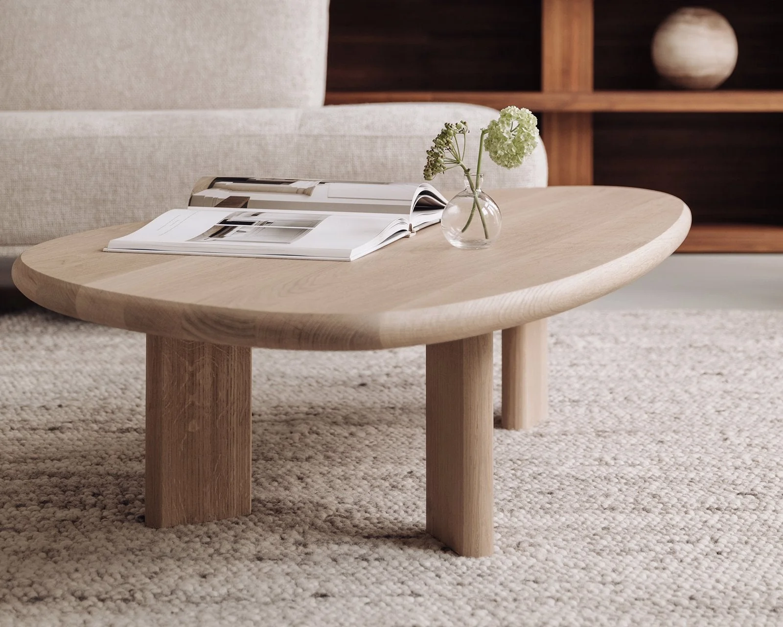 Oak Coffee Table - The Coffee Table showcases a beautifully organic shape crafted from solid oak - highlighting its naturally smooth surface and