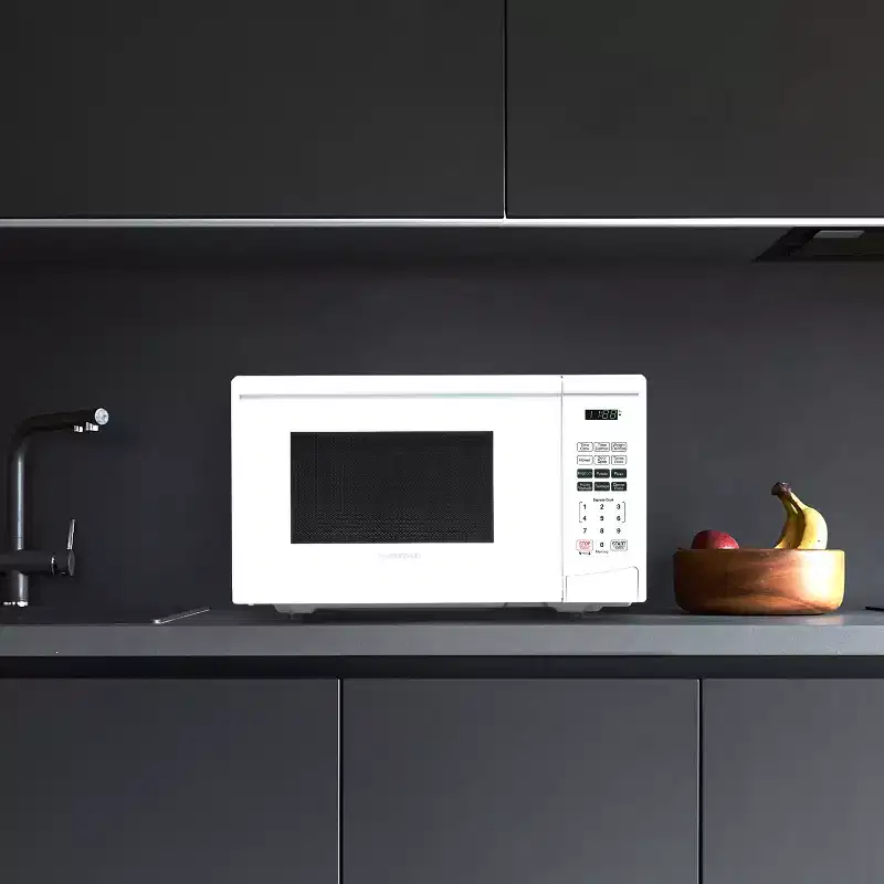 Farberware 900-Watt 0.9 Cu. Ft. Countertop Microwave Oven With LED Lighting and Child Lock, White