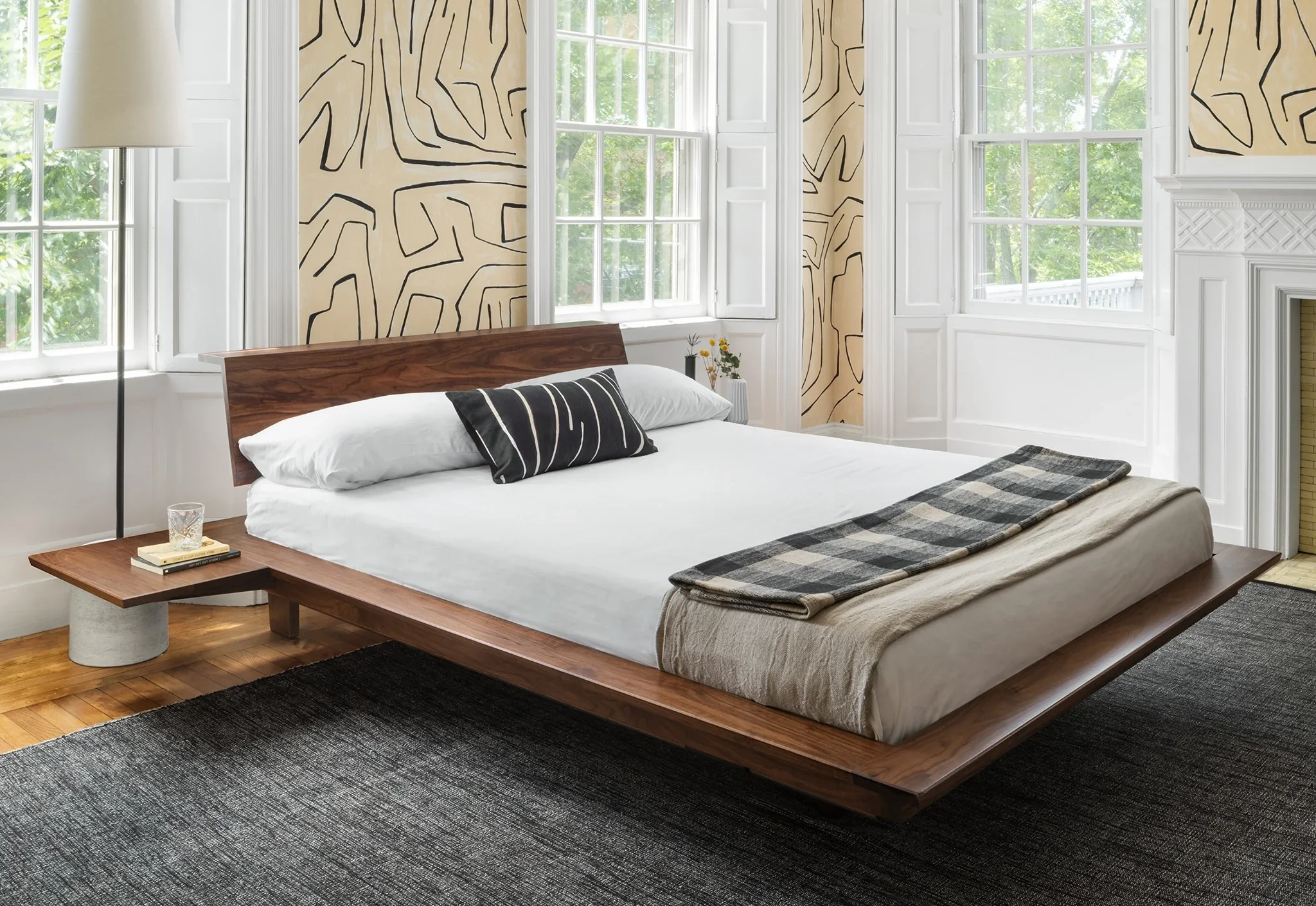 Platform Bed - The is minimalist to its core, stripping away pretense with its series of broad, surrounding surfaces