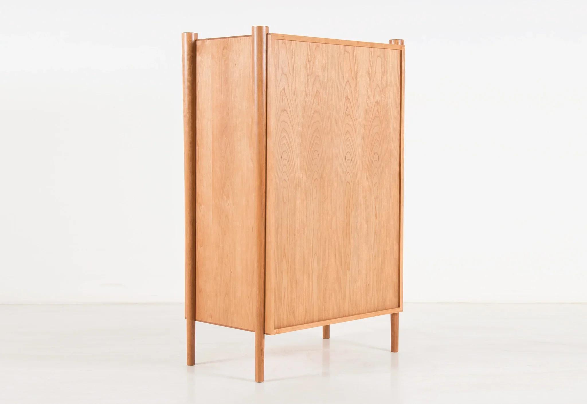 Dresser - Vertical - From its tapered legs and exposed end grain to its elliptical drawer pulls, the is confident in