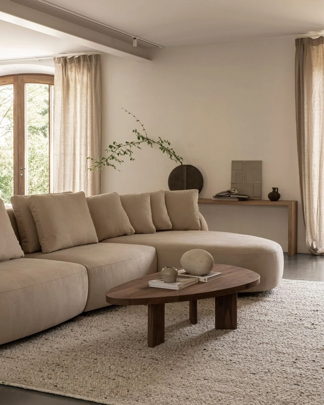 Oak Coffee Table - The Coffee Table showcases a beautifully organic shape crafted from solid oak - highlighting its naturally smooth surface and