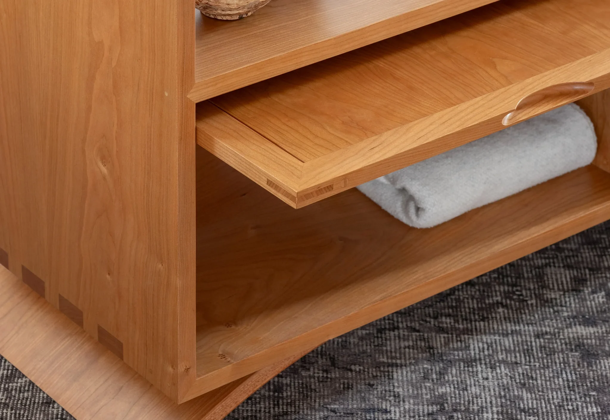 Credenza - The Credenza has two exposed surfaces for lamps, photographs, and reading materials with an enclosed storage