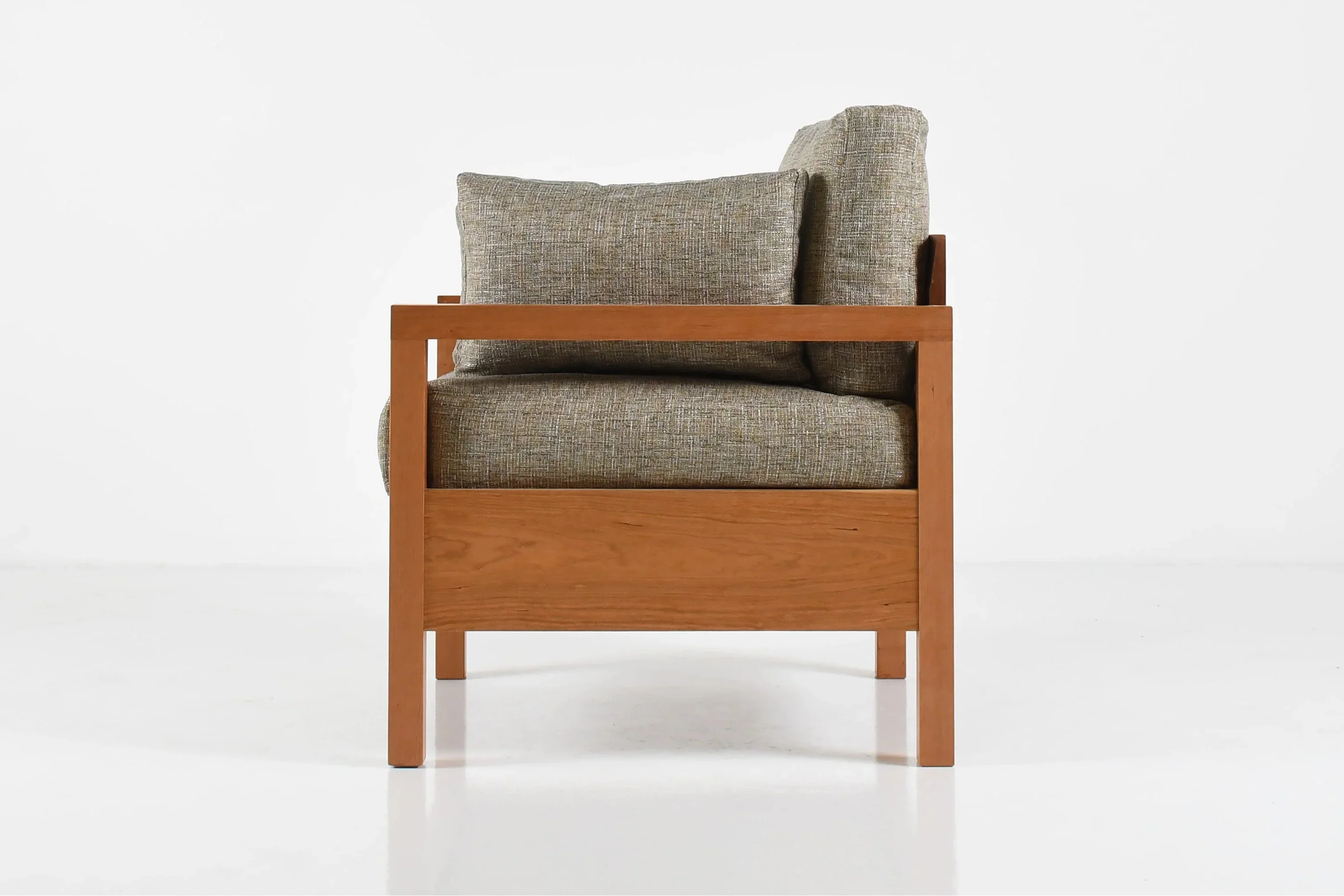 Lounge Chair - An expansion of its namesake collection, living is designed to make the most out of minimal lines while
