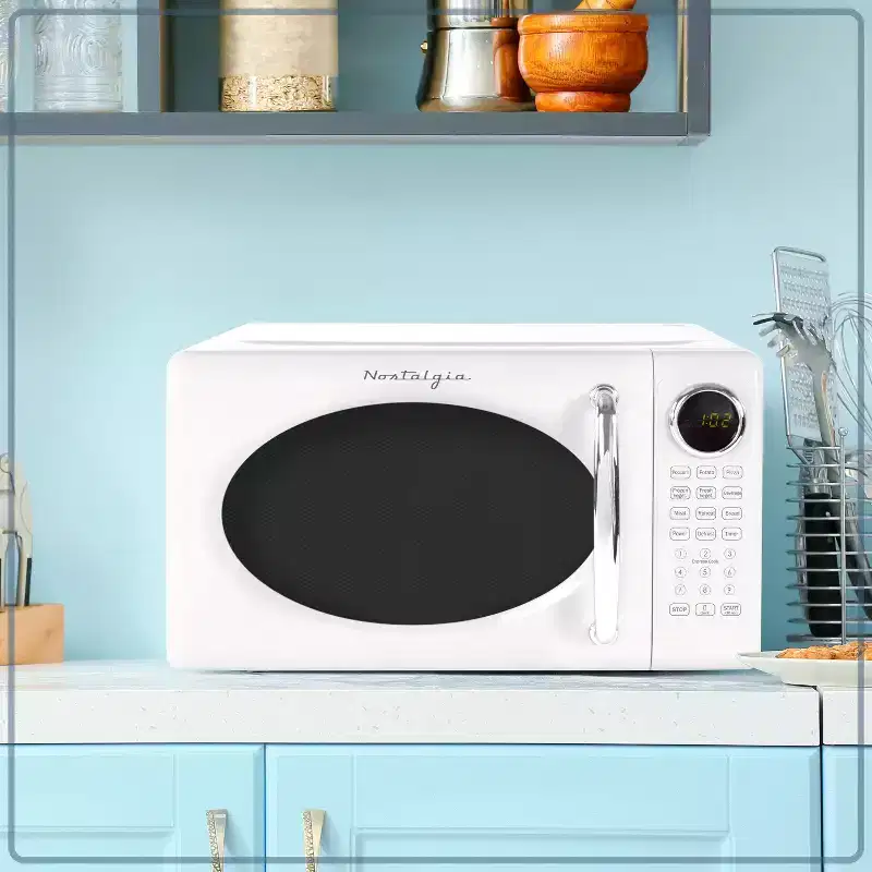 Nostalgia Retro Compact 0.7 Cu Ft & 700-Watt Countertop Microwave Oven