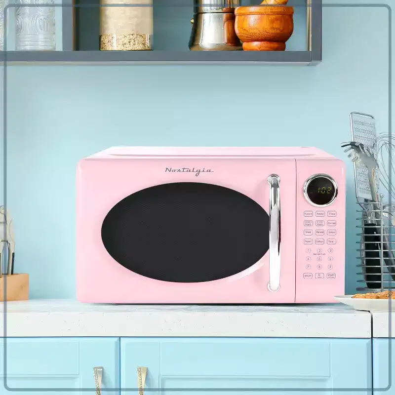 Nostalgia Retro Compact 0.7 Cu Ft & 700-Watt Countertop Microwave Oven
