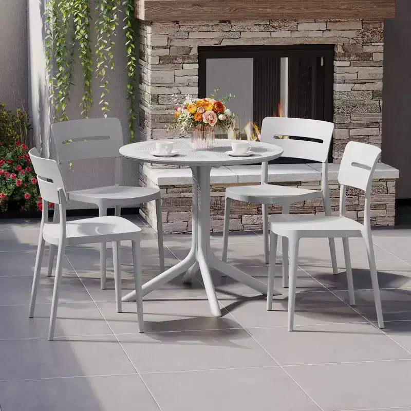 WestinTrends Playa Modern 5-Piece Resin Round Patio Dining Table Set with Stackable Patio Dining Chairs