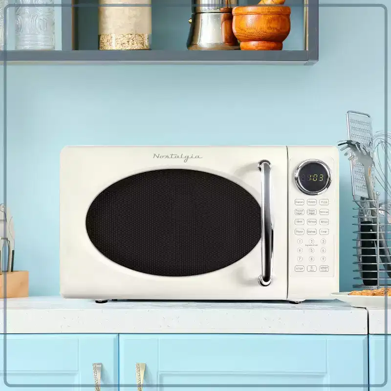 Nostalgia Retro Compact 0.7 Cu Ft & 700-Watt Countertop Microwave Oven