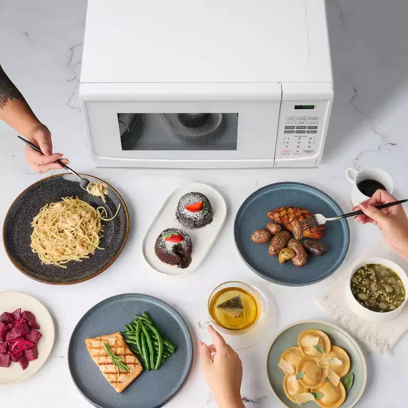 Farberware 900-Watt 0.9 Cu. Ft. Countertop Microwave Oven With LED Lighting and Child Lock, White
