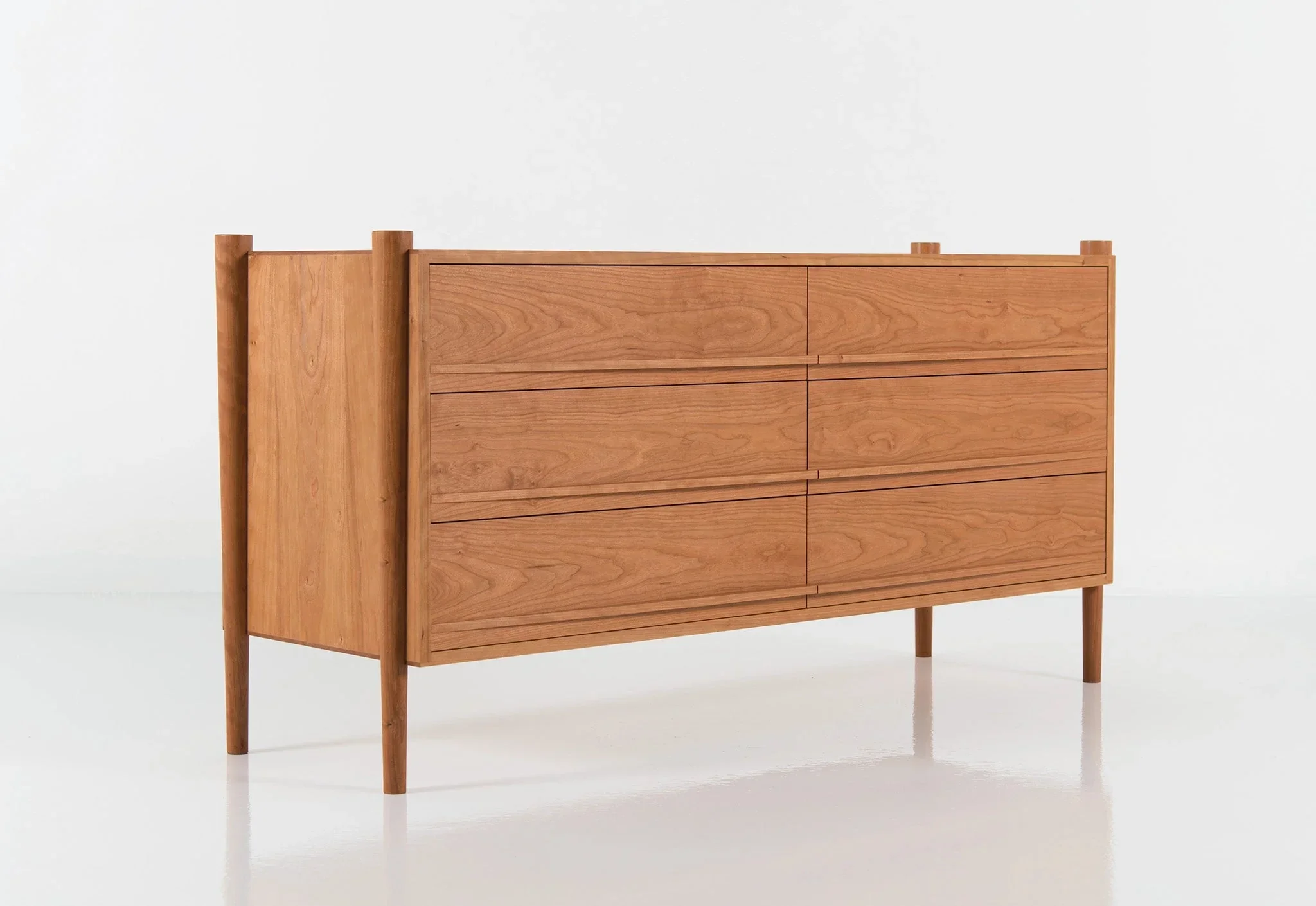 Dresser - Horizontal - From its tapered legs and exposed end grain to its elliptical drawer pulls, the is confident in