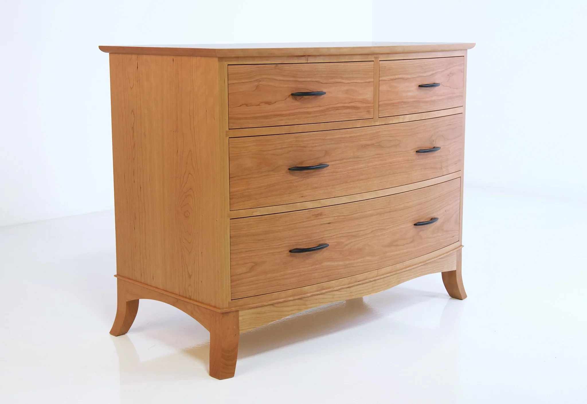 Four Drawer Bureau - Inspired by a request for a curved adaptation of our standard bureau, the demonstrates the value