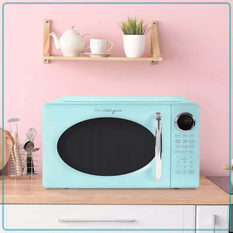 Nostalgia Retro Compact 0.7 Cu Ft & 700-Watt Countertop Microwave Oven