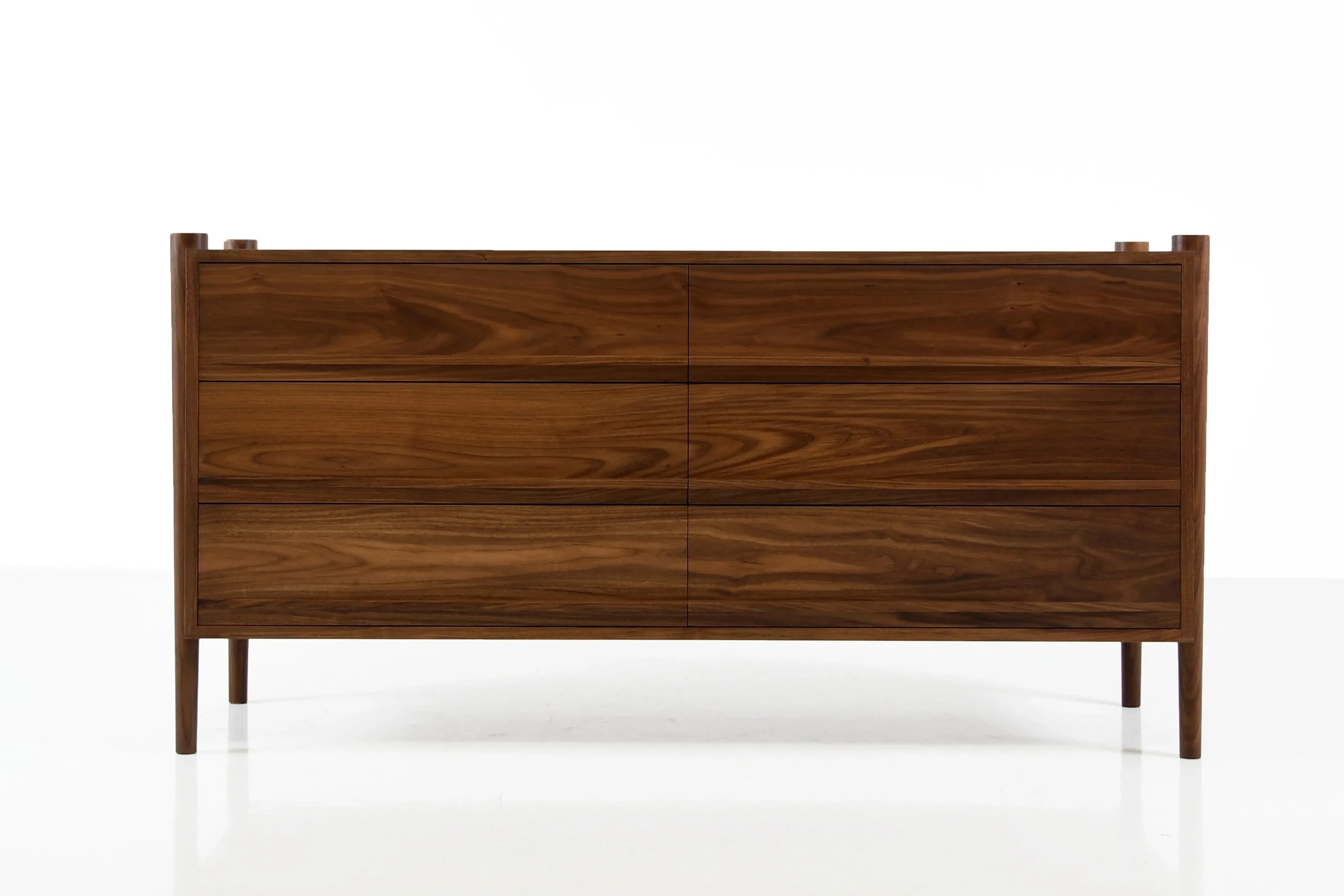 Dresser - Horizontal - From its tapered legs and exposed end grain to its elliptical drawer pulls, the is confident in