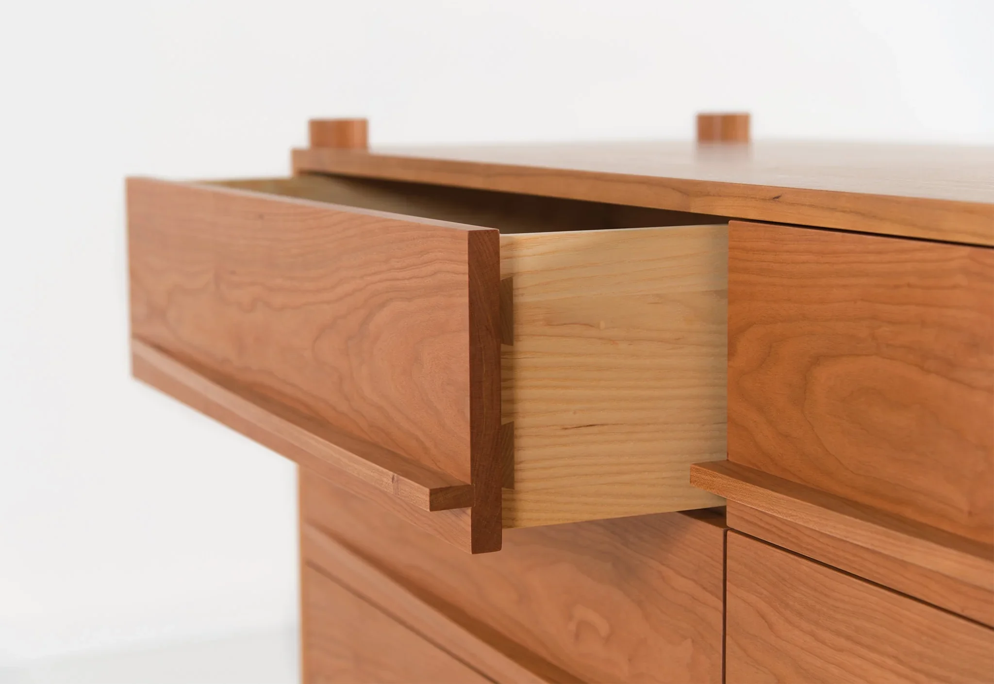 Dresser - Horizontal - From its tapered legs and exposed end grain to its elliptical drawer pulls, the is confident in