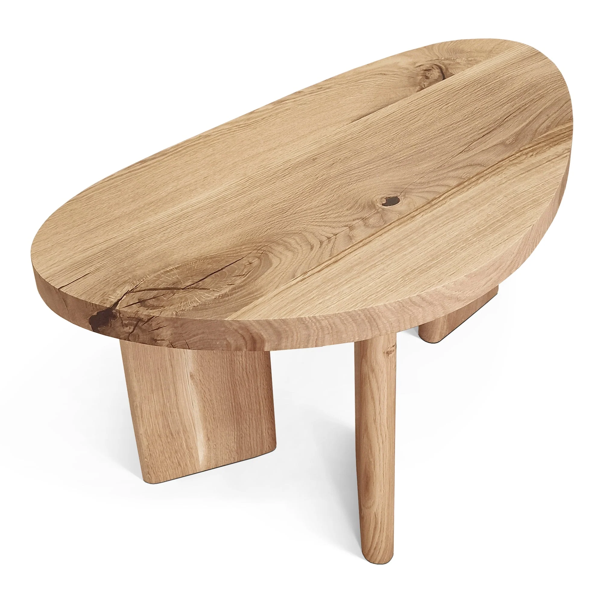 Oak Coffee Table - The Coffee Table showcases a beautifully organic shape crafted from solid oak - highlighting its naturally smooth surface and