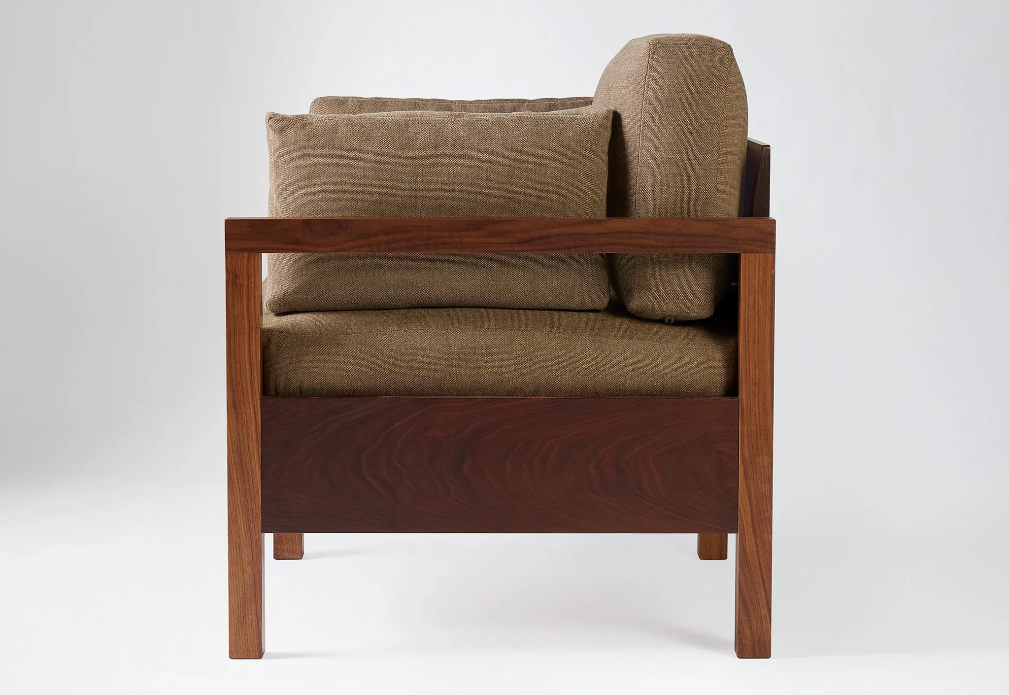 Lounge Chair - An expansion of its namesake collection, living is designed to make the most out of minimal lines while