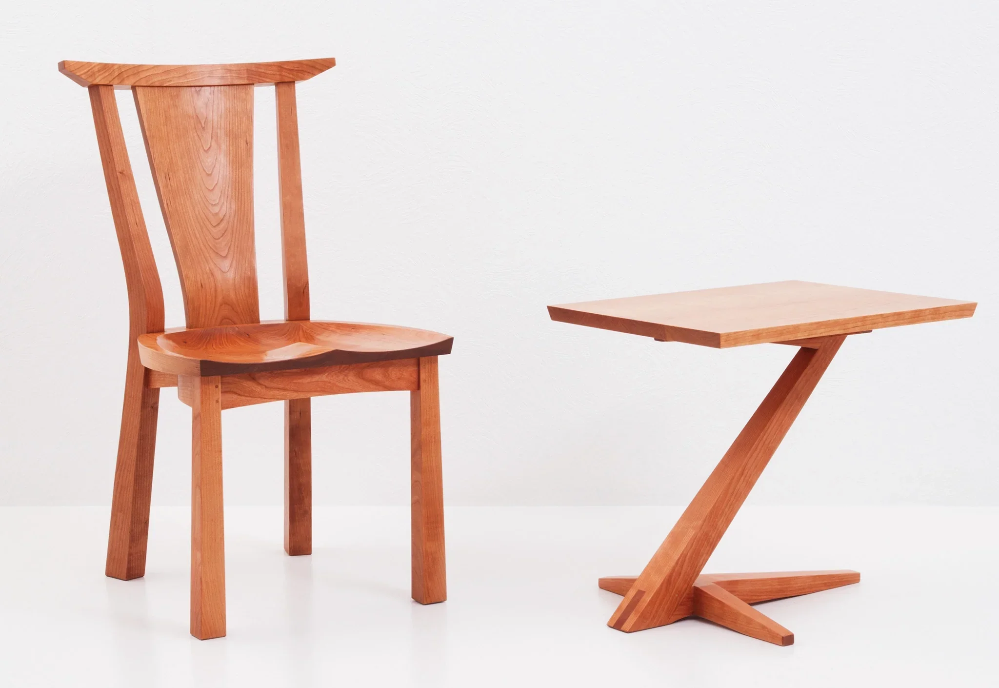 Cantilever Side Table - Perched atop a solid cherry or walnut base that rises from its splayed foot on a