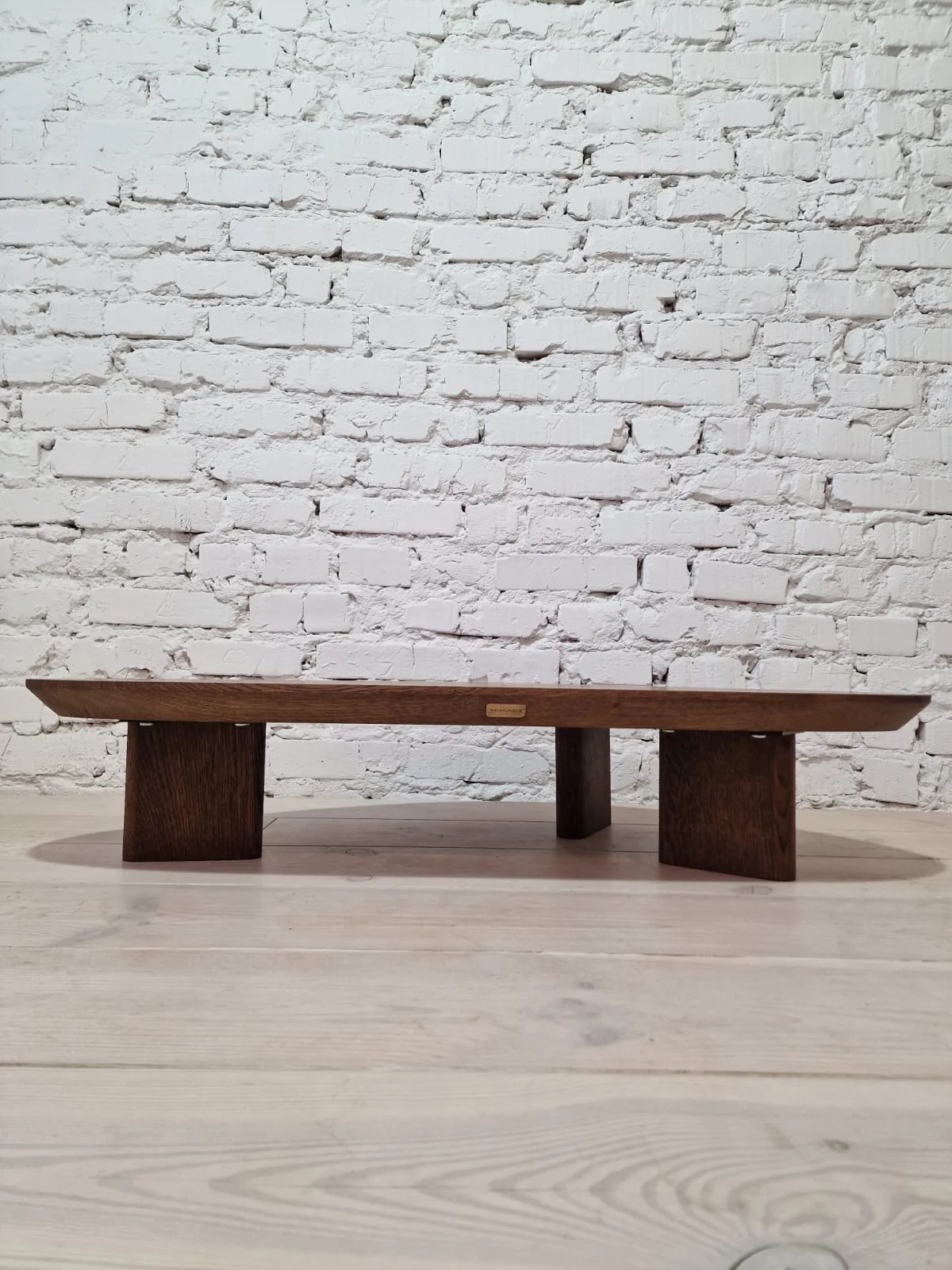 Oak Coffee Table - The Coffee Table showcases a beautifully organic shape crafted from solid oak - highlighting its naturally smooth surface and