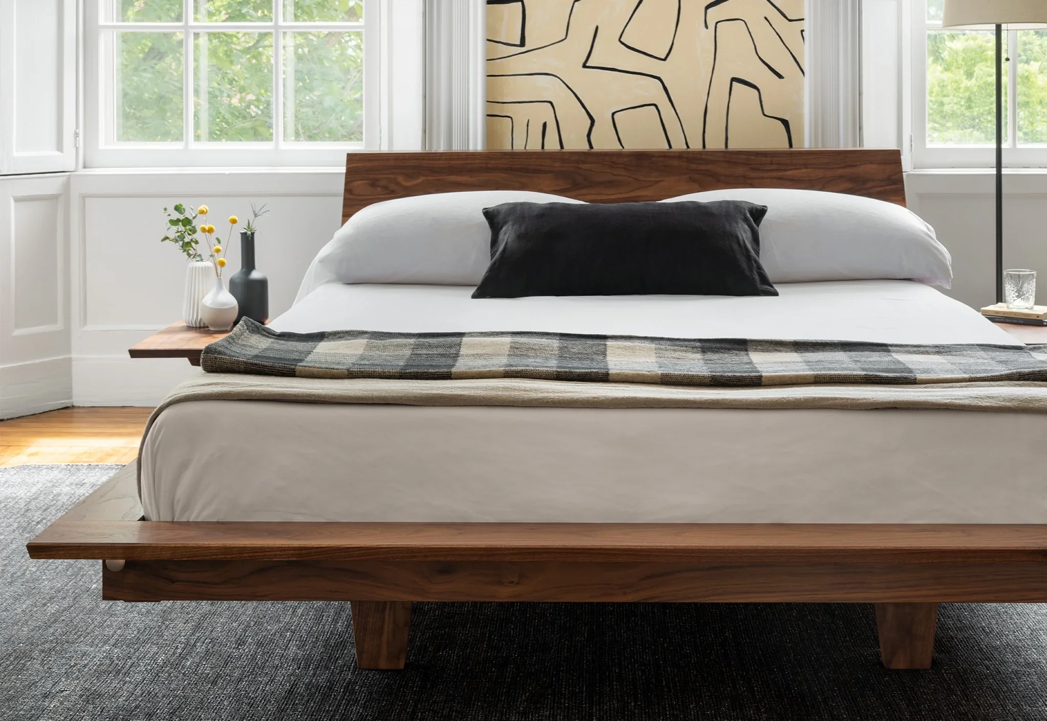 Platform Bed - The is minimalist to its core, stripping away pretense with its series of broad, surrounding surfaces