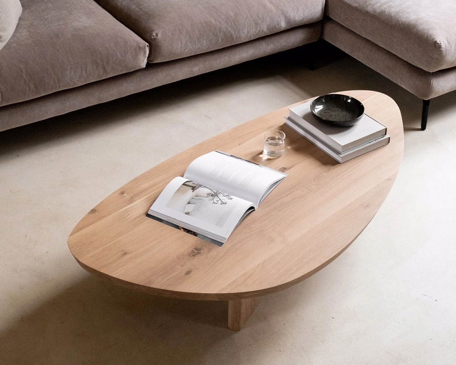 Oak Coffee Table - The Coffee Table showcases a beautifully organic shape crafted from solid oak - highlighting its naturally smooth surface and