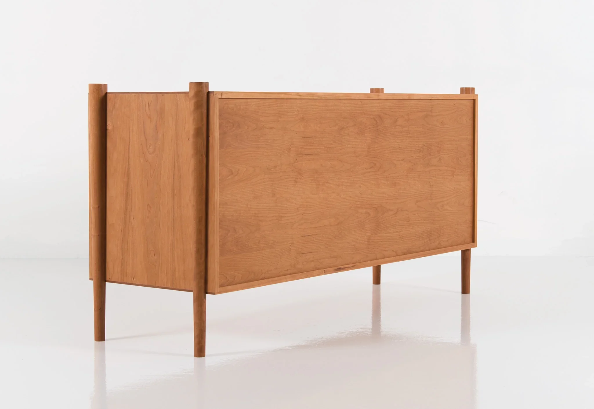 Dresser - Horizontal - From its tapered legs and exposed end grain to its elliptical drawer pulls, the is confident in